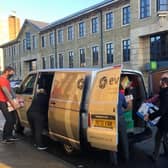 An Elland firm has donated food and hygiene products to a Halifax food bank