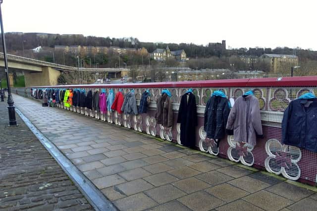 Coats and jackets along North Bridge for people to collect if they are in desperate need of clothing this winter