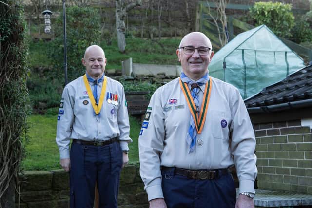 Group Scout Leader of Rastrick St Matthew's, Colin Watson, getting a British Empire Medal for services to scouting in new year's honours list. Pictured with his son and scout leader Nicholas Watson