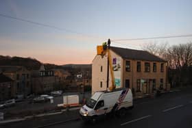 Engineers removing the pole at Saddleworth Road, Greetland, in December. Photo: Peter Smith