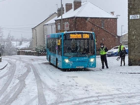 A bus struggling in the snow last week (file photo)