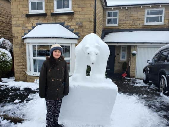 Ten-year-old Katie and eight-year-old Holly were ecstatic when they woke up to the snow yesterday morning