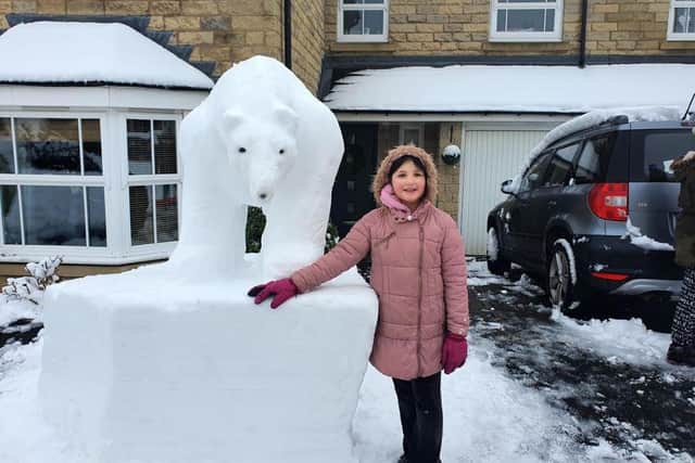 Ten-year-old Katie and eight-year-old Holly were ecstatic when they woke up to the snow yesterday morning