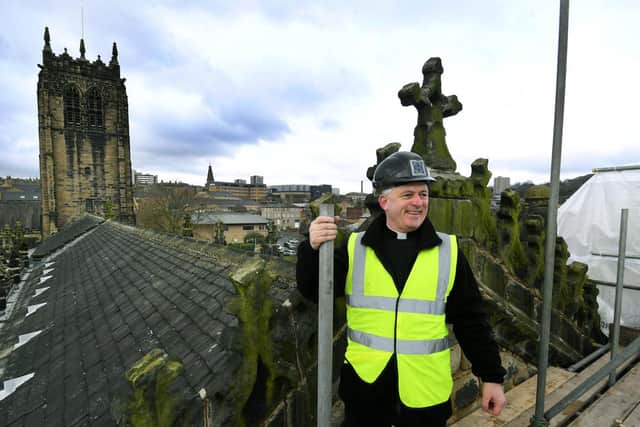 Vicar of Halifax, The Rev Canon Hilary Barber pictured on the roof of Halifax Minster
