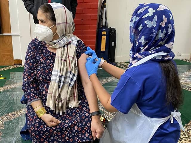 Members of the public being vaccinated at a community pop-up clinic at Elland Masjid on Saturday 6 March 2021