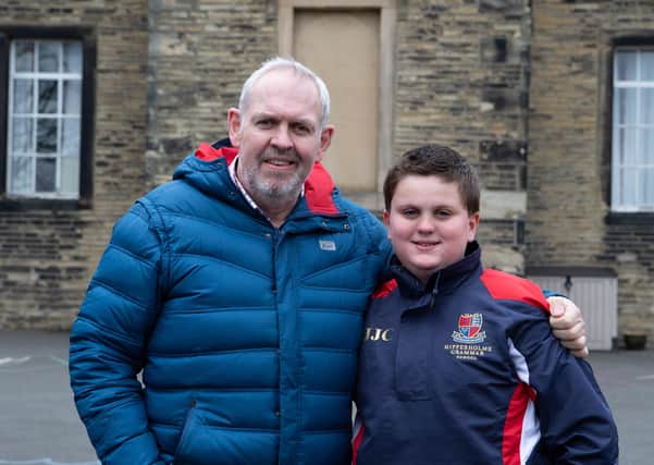 Henry Collett with dad Jools. Henry saved his  life with CPR learnt at Hipperholme Grammar School