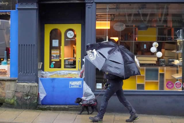 Shops and businesses in Hebden Bridge install their flood defences (Getty Images)