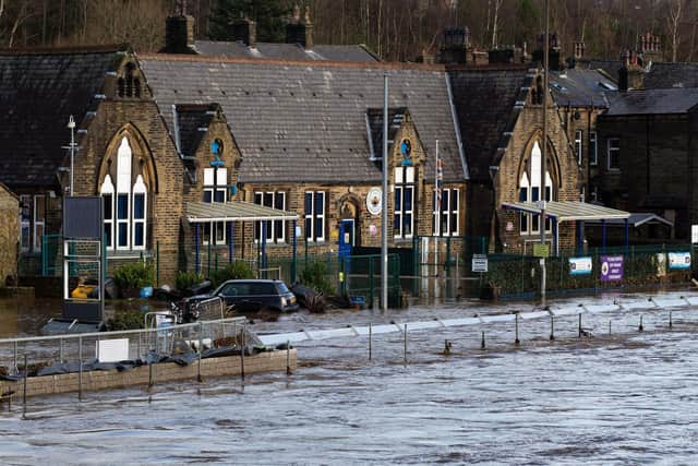 Burnley Road School, during flooding in Mytholmroyd