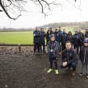 Rastrick Juniors Football Club celebrates funding for new facilities, Carr Green playing fields. Bobby Boskic, nine, chairman Martin Ford and Noah Cooper-Smith, six, with coaches.