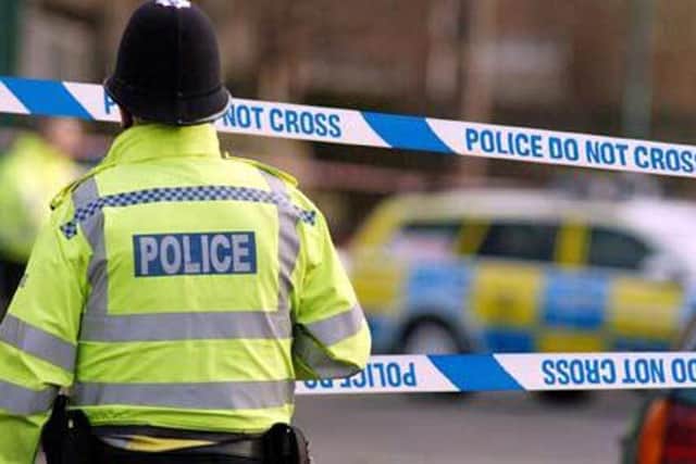 Police officers are investigating an reported robbery in Elland