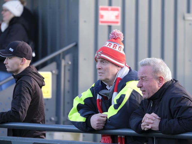 The Scarborough Athletic fans are fully focused on the action