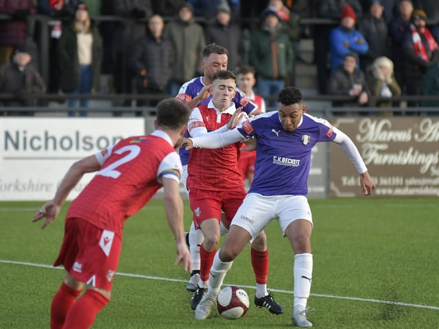 Lewis Maloney tries to get the ball back for Boro