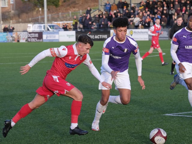 Brad Plant brings the ball forward