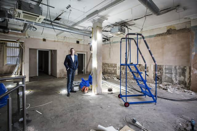 Afghan Rug Shop owner James Wilthew at the new premises