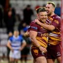 Winning start: Batley Bulldogs' players Tom Lillycrop, left, and Adam Gledhill celebrate their win over Halifax Panthers. Picture: James Hardisty