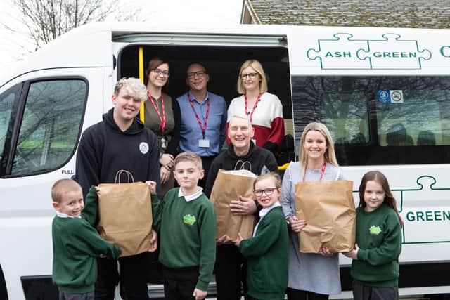 Staff, pupils and church volunteers have been helping distribute food donated after the fire at Ash Green Primary School