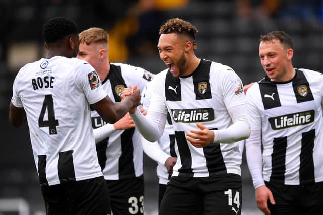 Notts County's former Halifax loanee Kyle Wootton (centre)