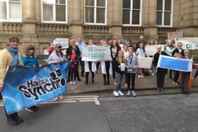 Young synchronised swimming club swimmers protesting about the concerns outside Halifax Town Hall last autumn