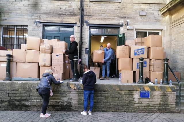 Boxes of aid for Ukraine ready to be loaded on to the lorry at Dean Clough in Halifax yesterday.