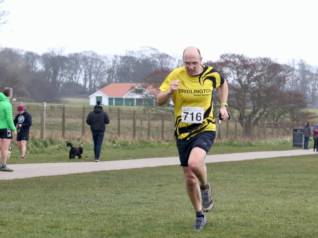 A Bridlington Road Runner digs deep at the East Yorkshire Cross Country League fixture at Sewerby
Photo by TCF Photography