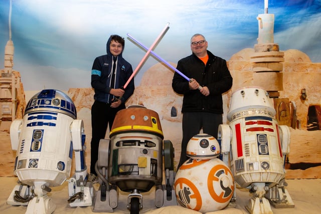 Jake and Arron Wilson, with R2D2 and friends, at Hali-Con 2019,