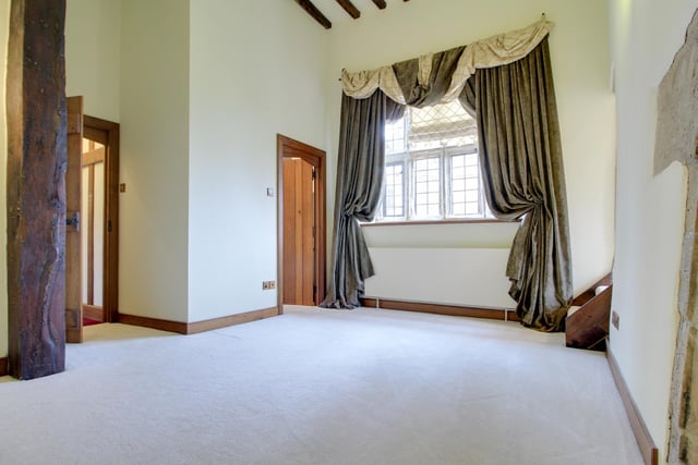 There is plenty of natural light within rooms, due to large windows such as this one.