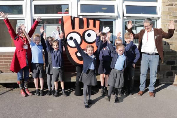 Barkisland CE Primary School pupils are joined by Coun Alexandra Greenwood, Coun Peter Hunt and Strider