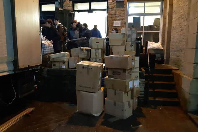 Boxes of aid for Ukraine waiting for be loaded onto the lorry at Dean Clough in Halifax