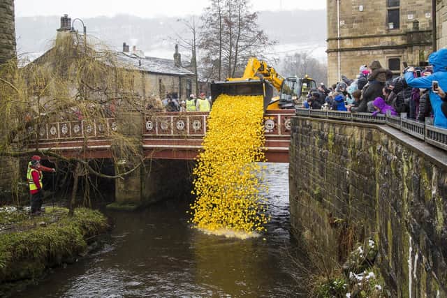 Crowds watch Hebden Bridge’s Easter Monday charity Duck Race in pre-pandemic times.