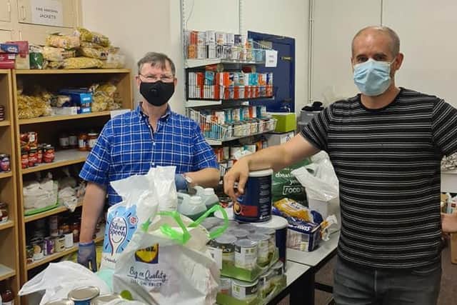 Martin Durgan (left) NBCC - Paul Holdsworth (right)
The Hub handing back the food bank to the church