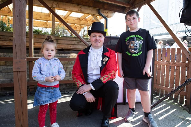 Youngsters with the ringmaster at Brighouse Open Market fun day