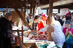 Shoppers enjoy the stalls at Brighouse Open Market