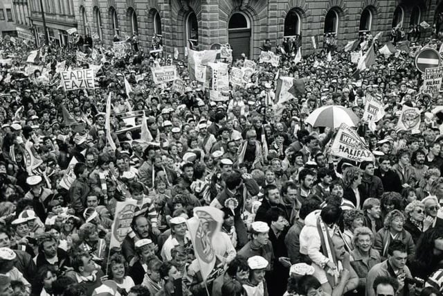 Halifax RLFC fans crowd around the Town Hall in 1987 after Halifax's Challenge Cup triumph against St Helen's at Wembley.