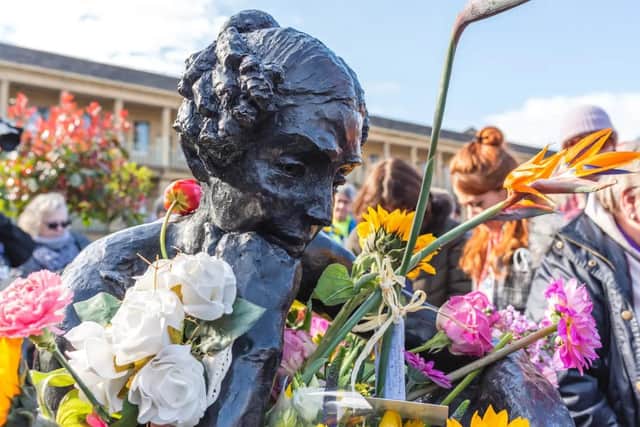 Flowers were laid at The Piece Hall where there is a statue of Anne Lister