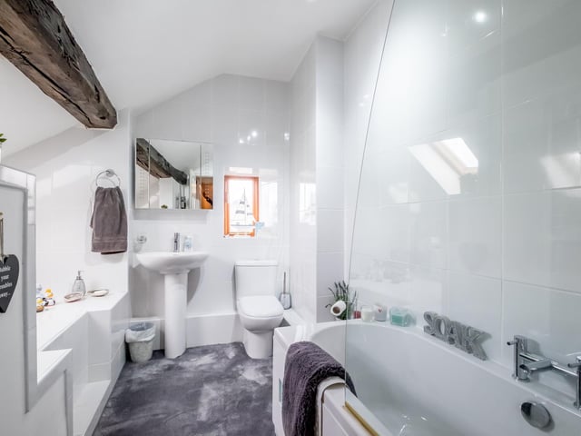 A light and well equipped bathroom facility within the house.