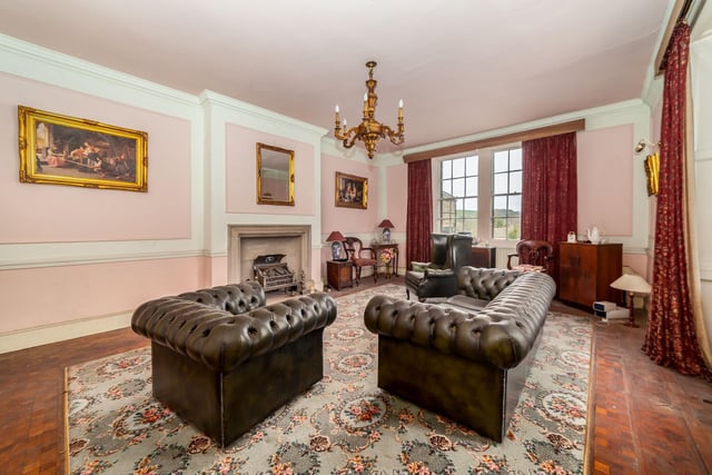 One of five reception rooms on the ground floor of the property.