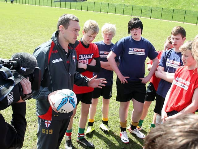 Rugby league legend Kevin Sinfield took time out to teach skills to students at Trinity Acadamy and St Catherines High, Holmfield.