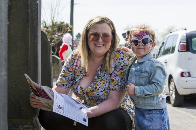 Emma Ward and Isla Ward, three, looking out for scarecrows