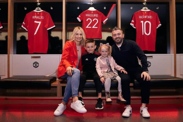 Jack at Old Trafford with his mum, dad and sister
