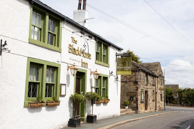 The Black Horse Inn, Westgate, Clifton, Brighouse.  "Family-owned, this distinctive 17th-century inn radiates a traditional British charm that blends in effortlessly with the surrounding Georgian architecture."