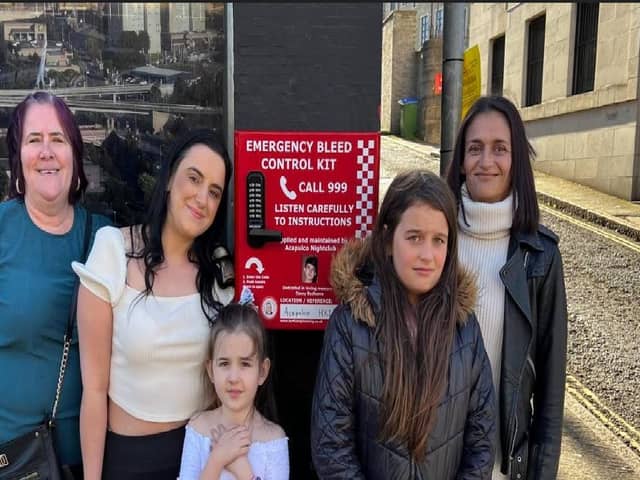 The family of Casey Badhams with the first bleed control cabinet installed at The Acapulco in Halifax. Josie Baldry, Jade Kershaw, Lilah Badhams, Laney Pemberton and Mina Kershaw