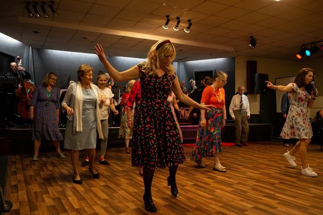Dance instructors put the guests through their paces
