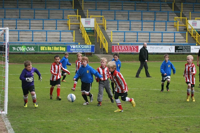 Action from the Junior World Cup football event at the Shay in May 2013. Picture Gordon Wilkinson