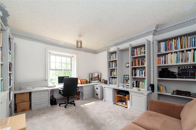 A room suitable as a study, office or library, with inbuilt shelving.