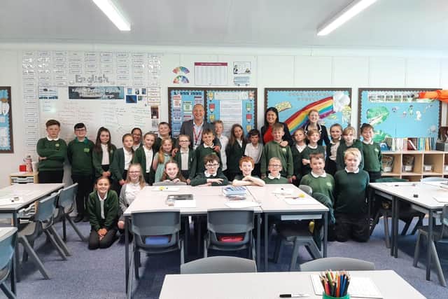 Shadow Secretary of State for Levelling Up, Housing, Communities and Local Government with Halifax MP Holly Lynch and headteacher Mungo Sheppard with children at Ash Green Primary School in Mixenden, Halifax