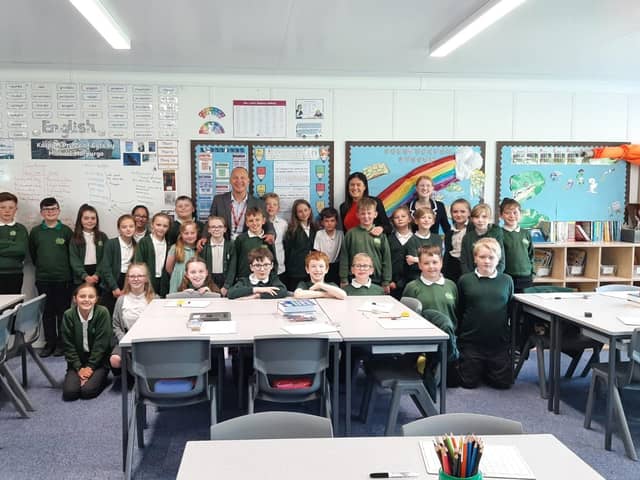 Shadow Secretary of State for Levelling Up, Housing, Communities and Local Government with Halifax MP Holly Lynch and headteacher Mungo Sheppard with children at Ash Green Primary School in Mixenden, Halifax