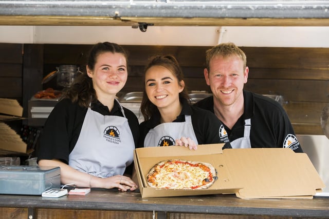 Ripponden Jubilee Food and Drink Market. Serving wood fired pizza, from the left, Niamh Kerrigan, Yasmin Lee and Tom Rawnsley.