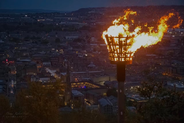 The beacon on Beacon Hill was among thousands lit to mark the milestone. Photo by David Robertshaw