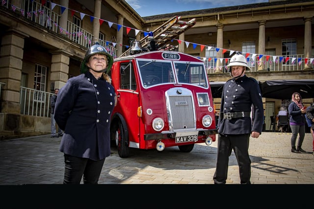Lynn Robinson and Ian Leaver with a 1954 Dennis F8 fire engine at The Piece Hall's day dedicated to the emergency services