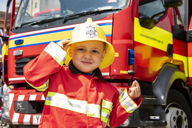 Jayden Jones, three, with a fire engine at the emergency services day. Picture Tony Johnson